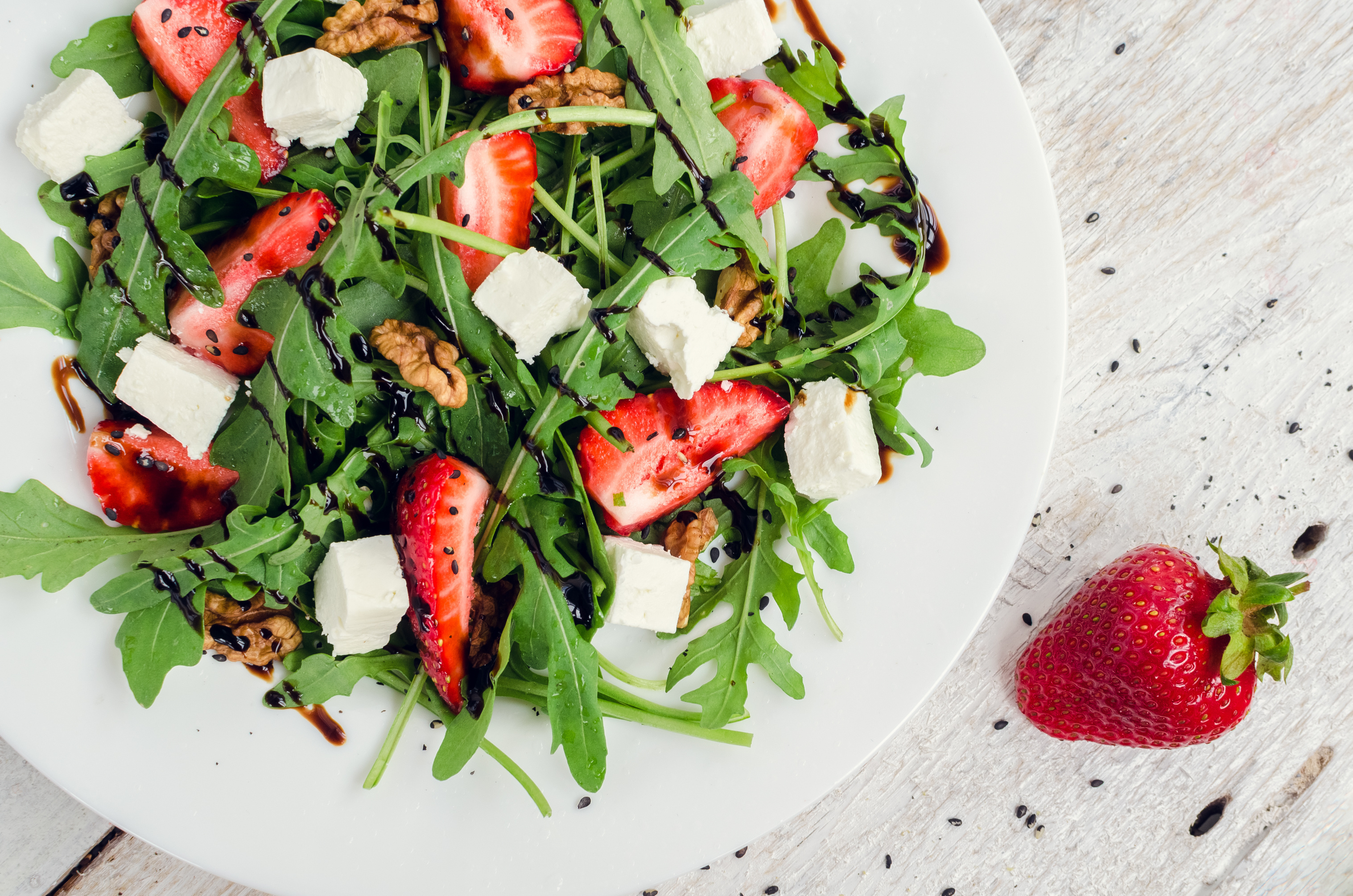 strawberry salad on table